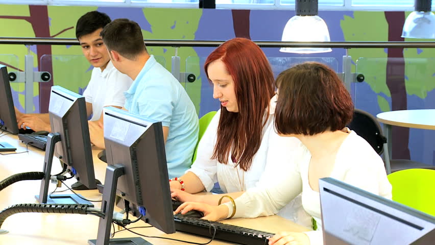 Group of multi ethnic students e-learning communication in IT technology class