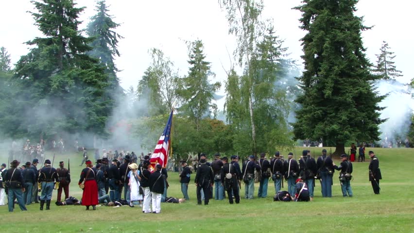 PORT GAMBLE, WA - JUN 20:	Confederate and Union infantry trade volleys in a mock battle at Port Gamble WA on June 20, 2009.