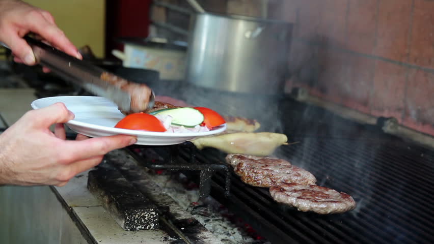 Chef cooking at commercial kitchen. HD1080p.