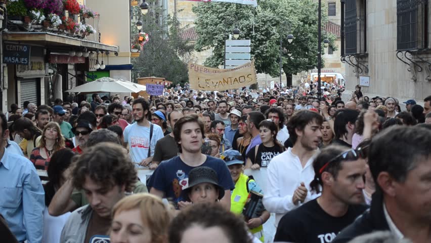 LEON, SPAIN - CIRCA 2011: People take a part in a demonstration in solidarity action for the worldwide protest dubbed "Occupy the City" in Leon, Spain on October 15, 2011.