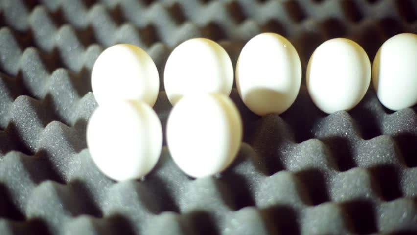 Eggs going into an egg crate