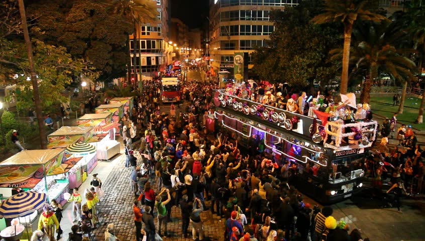 LAS PALMAS DE GRAN CANARIA, SPAIN - FEBRUARY 18: 200,000 masked revelers and a hundred or so festooned cars and floats in the Grande Parade (Gran Cabalgata ) of the Carnival February 18, 2012, Spain 