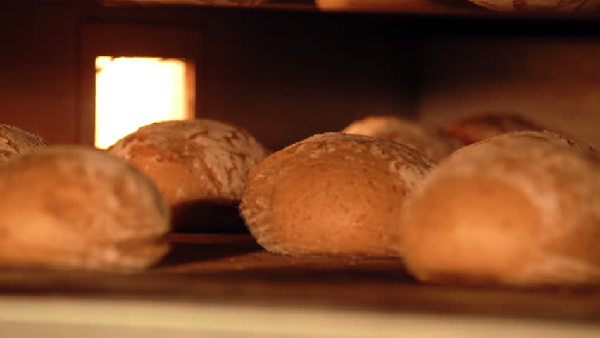 Bread is baked in the baker's oven in the time lapse. Short version.
