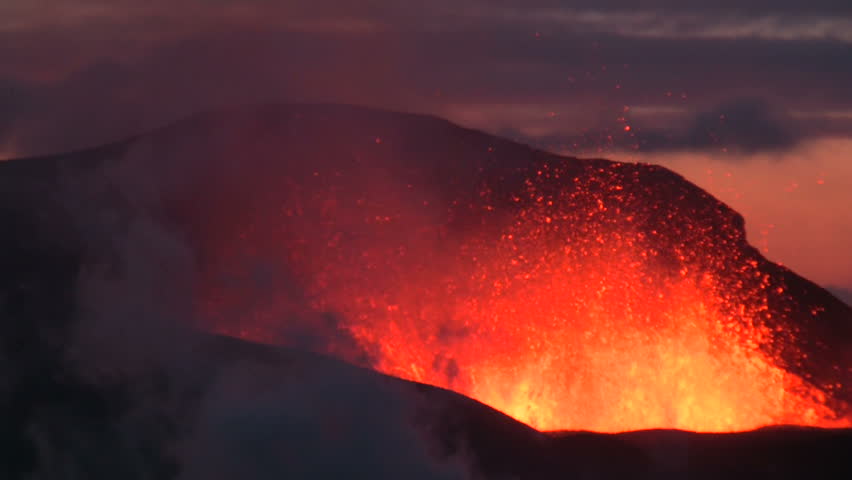 Volcanic Eruption in Iceland  2010 in Eyjafjallajokull. Footage taken in extreme conditions only a half mile from the crater during frequent gas explosions from advancing lava. A mountain is born.