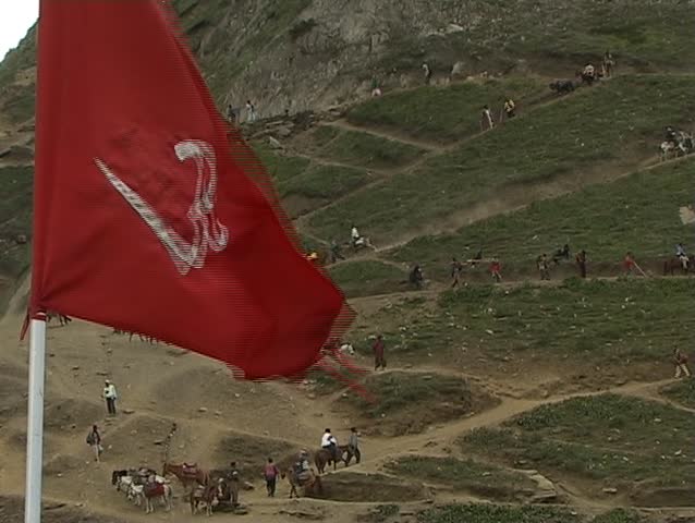 Pilgrimage to the holy Amarnath cave in the Himalayas on narrow twisting road