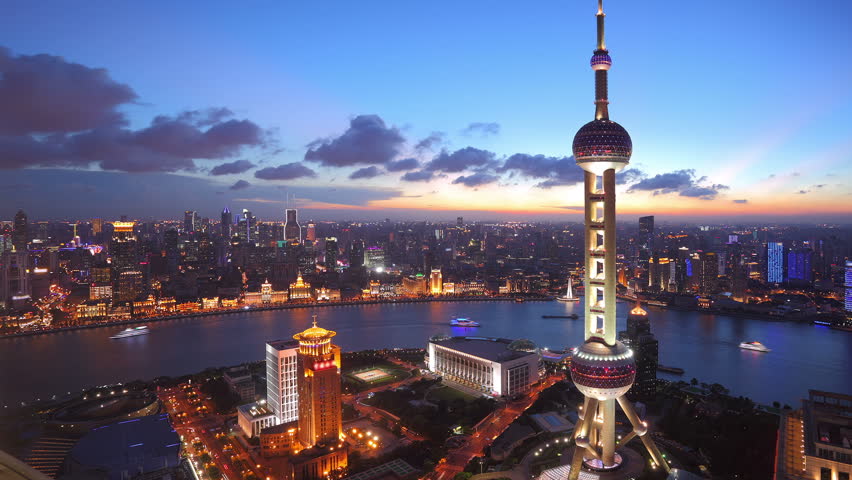 Shanghai, China - CIRCA JULY 2012:  Time lapse of Shanghai Skyline and Oriental Pearl Tower at dusk.