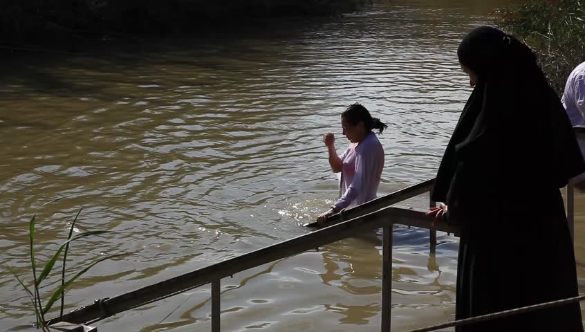QASR AL YAHUD, ISRAEL â JANUARY 18: Greek Orthodox pilgrims baptize during the Epiphany at Qasr Al Yahud, Israel, January 18 2012