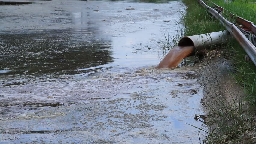 Dirty water flows from a pipe