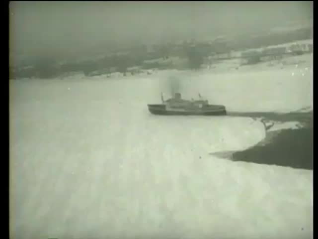 Canadian ship D'Iberville makes its way through frozen Saint Lawrence River for Montreal in Canada circa 1958-MGM PICTURES, UNIVERSAL-INTERNATIONAL NEWSREEL, USA, filmed in 1958
