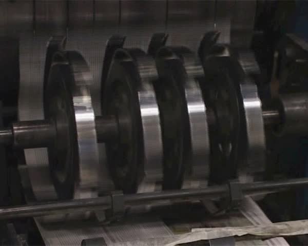 18 August, 2008. Slovakia. Tatras. At a small paper factory print fresh morning newspaper.