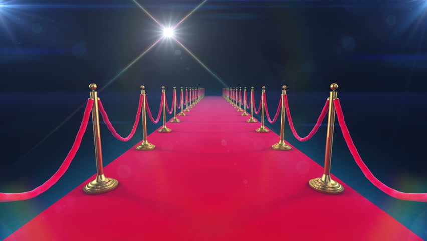 Unrolling Red Carpet animation and paparazzi camera flashes.