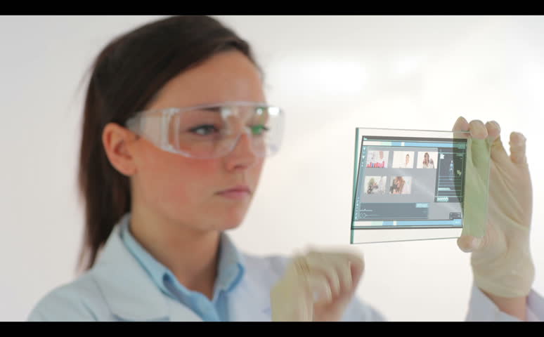Scientist wearing protective clothes and watching holographic videos of research