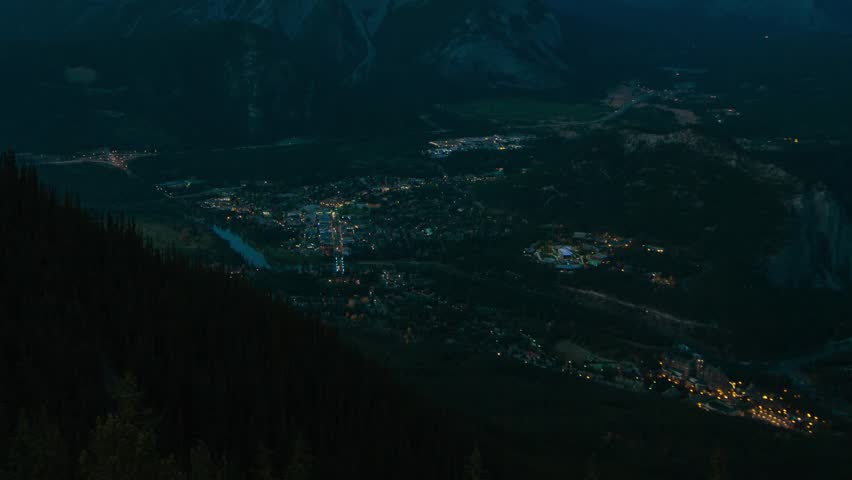 Overlooking the city of Banff, Alberta,Canada. Time lapse of city lights and traffic keep moving in the city of Banff