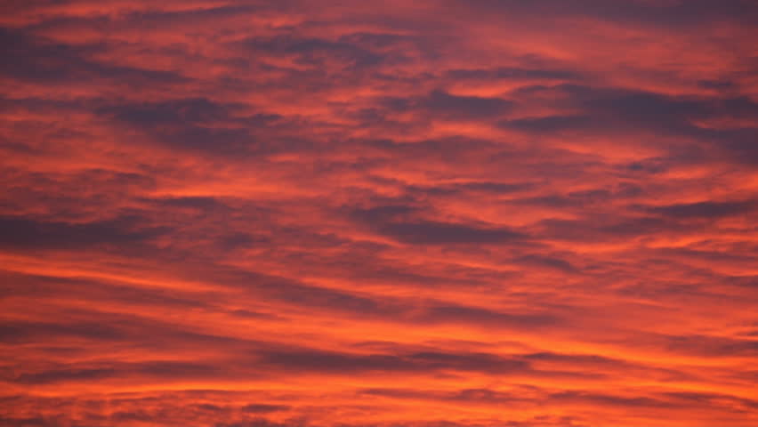 Evening red clouds (time lapse). Darkening sky at sunset. Natural background. October 2012. 