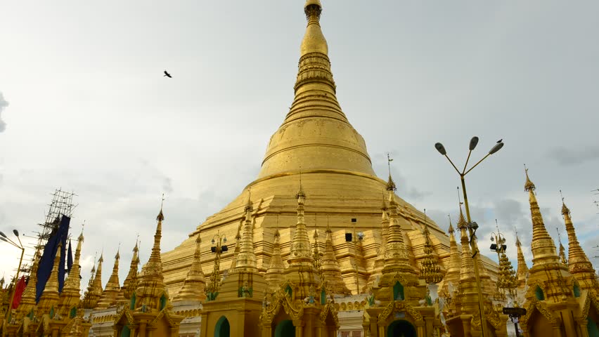 YANGON, MYANMAR - OCTOBER 24: Time lapse of tourists walking around the Shwedagon Pagoda Yangon on October 24, 2012 in Yangon, Myanmar