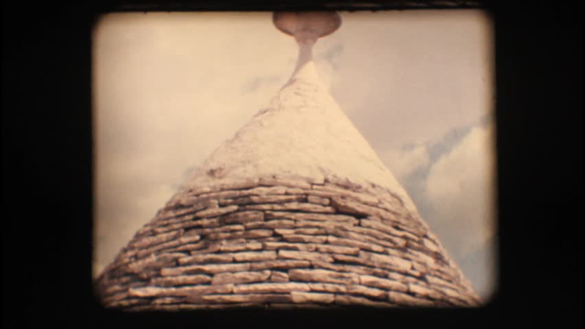 Vintage 8mm. Roof of a trullo, a traditional apulian dry stone hut

