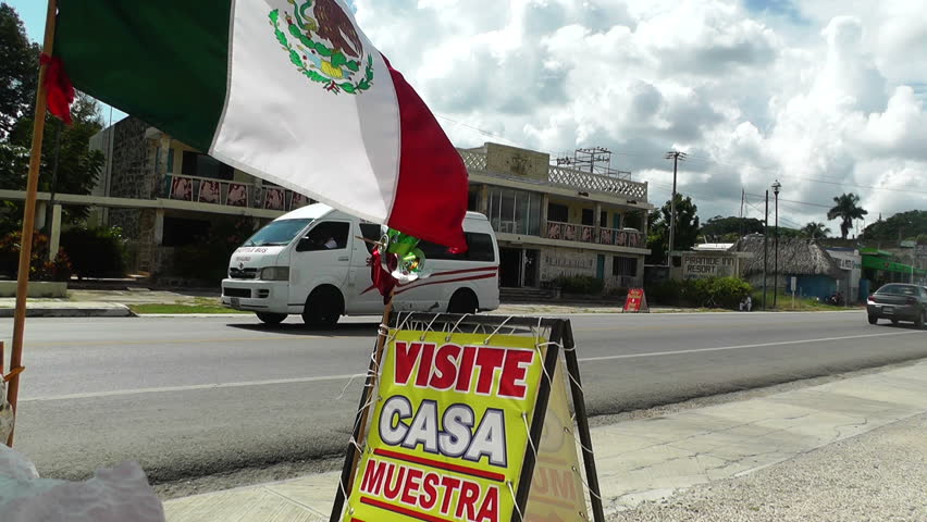 MEXICO YUCATAN - SEP 28: Mexican traffic and homes in the Yucatan in 2012