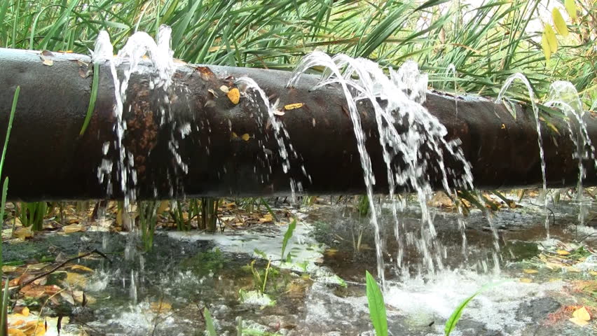 Water leaking from old rusty water supply pipe HD
