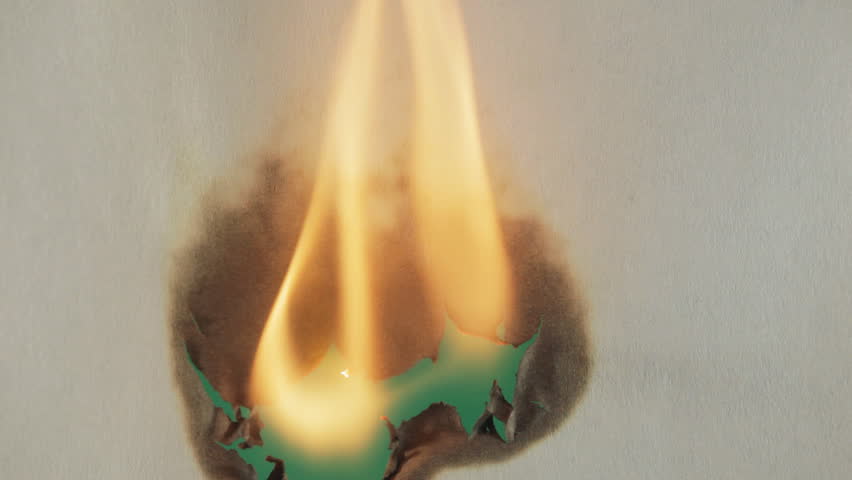 Burning paper. Green screen.