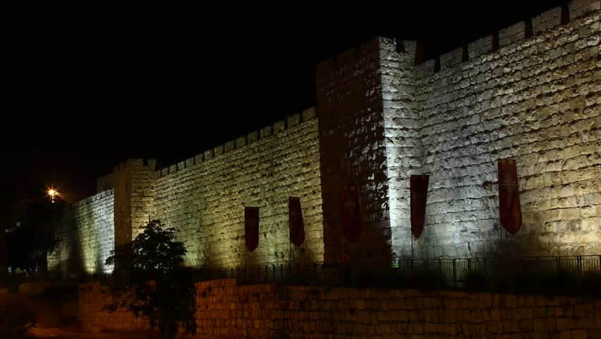JERUSALEM, ISRAEL - NOVEMBER 01: Tourists hurry to their destinations near the wall of Jerusalem, time lapse view, Israel, 01 November 2012