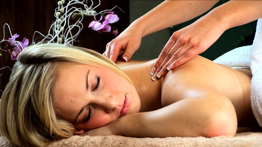 Beautiful blonde girl is pampered at the health spa