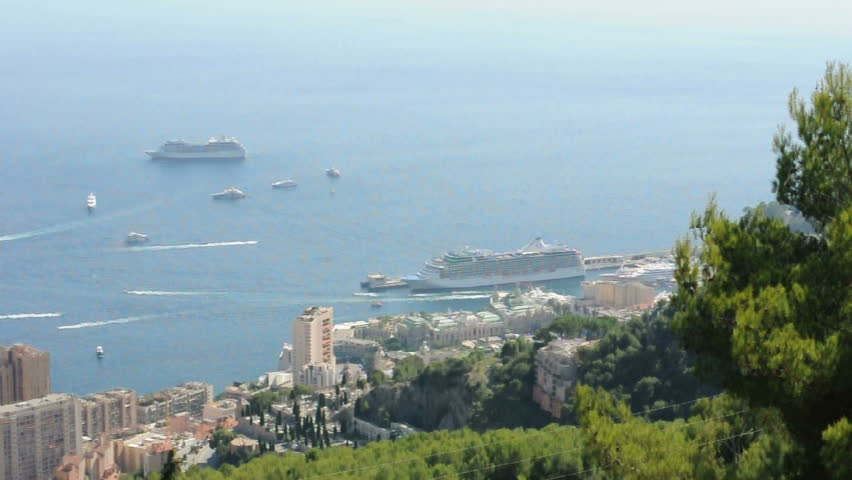 Large cruise ships and yachts on the French Riviera.