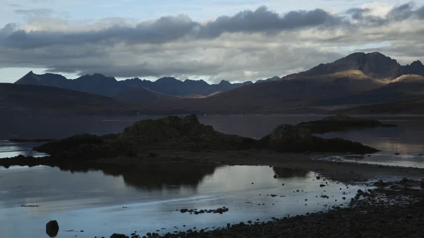 Timelapse of the beach at Ord, Isle of Skye, Western Isles, Scotland looking over to the Cuillin mountain range.