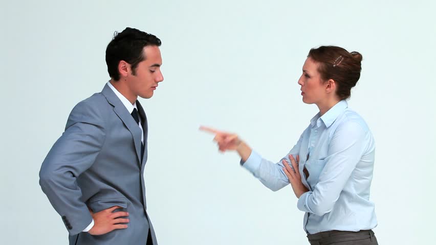 Business co-workers quarreling against white background