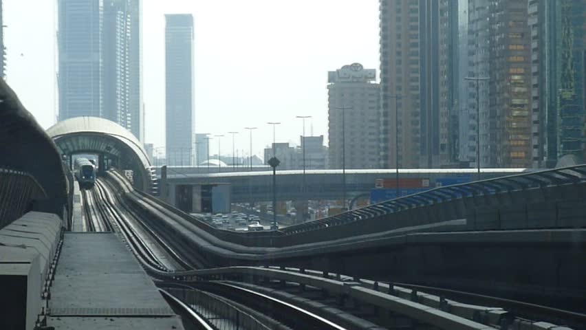 The Dubai Metro arriving at a platform, it is the world's longest driver less, fully automated metro network in the United Arab Emirates city of Dubai.