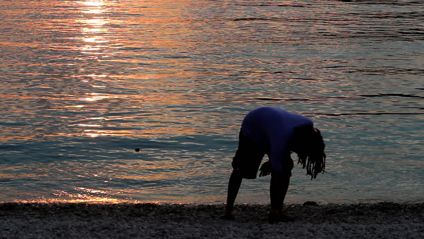 Sunset pebble throwing

Description: Boys throwing pebbles in the water

