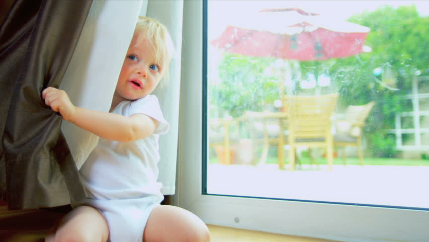Cute Baby Playing Hide Seek