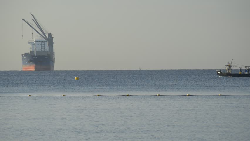 Fishing boat is moving to its hidden spot, red Sea, Eilat, Israel