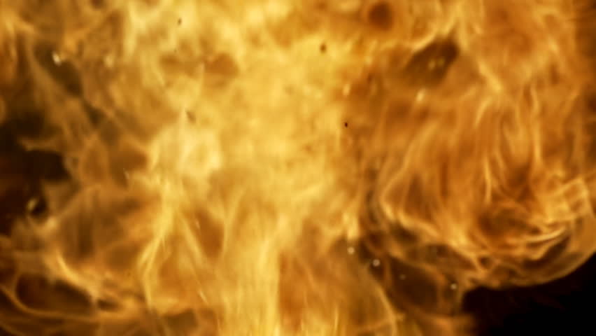 Slow motion flame and fire from exploding particulate matter.