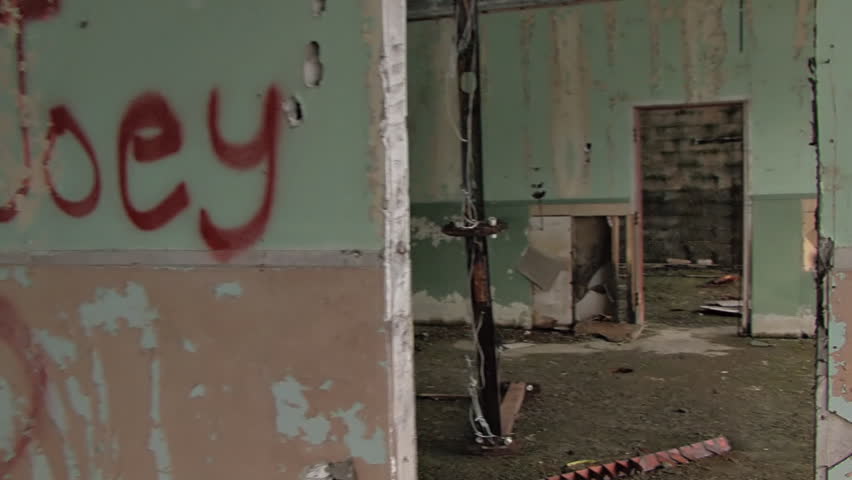 Empty, barren ruins of an old building. Glidecam shot.