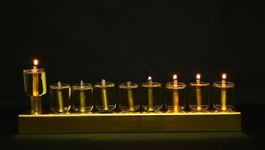 4 flames in Hanukia made of olive oil lanterns