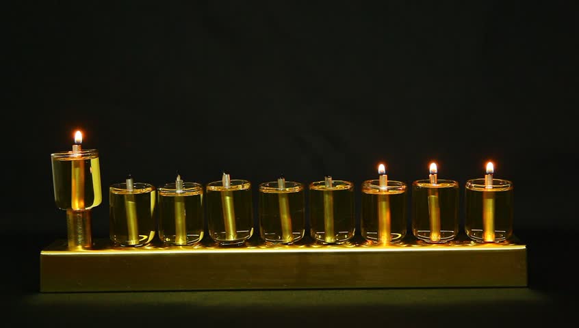 3 flames in Hanukia made of olive oil lanterns