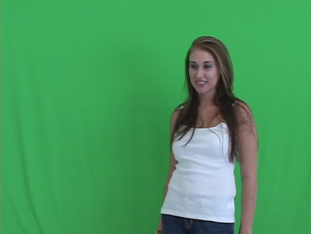 Pretty happy girl jumping for joy, shot on greenscreen