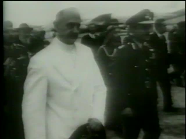 Pope Paul Sixth walks with King Hussein of Jordan in Amman airport during the first visit to Jordan, January, 4 1964-MGM PICTURES, UNIVERSAL-INTERNATIONAL NEWSREEL, USA, filmed in 1964 