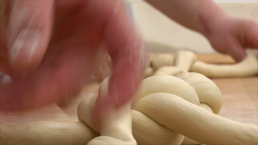 Two baker bread plait braid super close. 