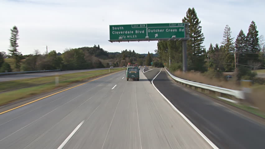 CLOVERDALE, CA - CIRCA 2012: Ambulance passing a VW bus on the 101 freeway near Cloverdale, CA.