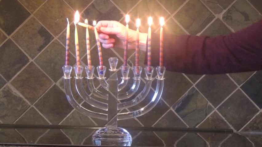 Lighting Hanukkah Candles 8th Night