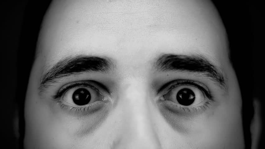 SUPER 35MM CAMERA - Gruesome, pale and demonic man with awful grimace - graded uniquely for the effect 
