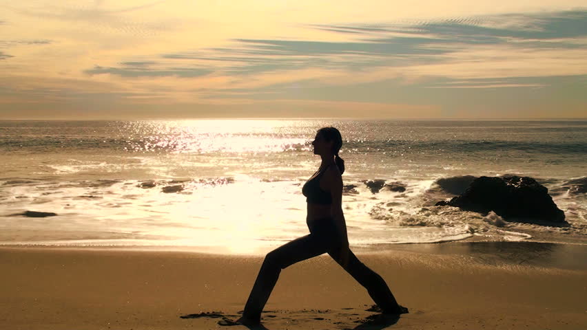 Yoga on the beach at sunset - V7  prayer twist HD 1080i