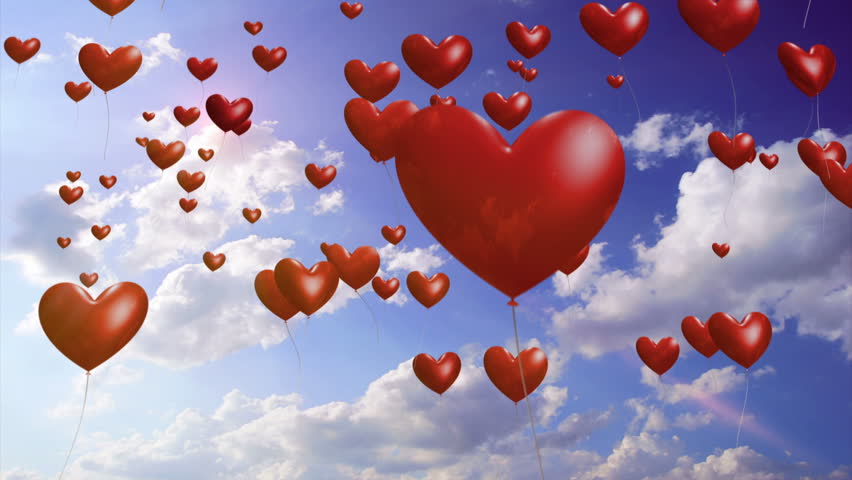 Heart Balloons - Romantic / Wedding Video Background Loop  ///  Heart-shaped balloons rise into a sunny sky. This is a gorgeous video background for weddings, parties and celebrations.