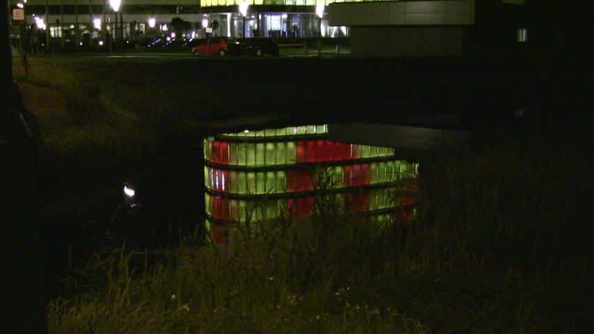 neon builing reflexion in the water