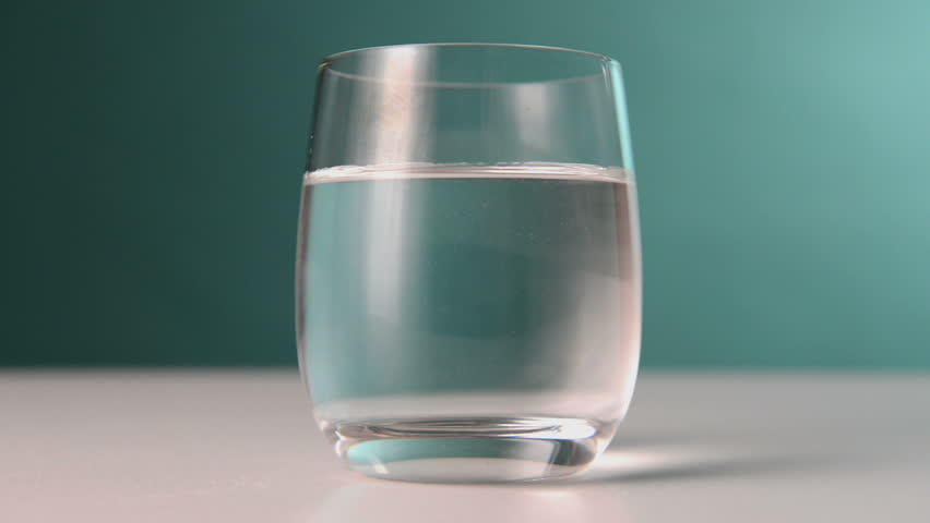HD1080p: Aspirin in a glass.
Effervescent pill dropped into the water