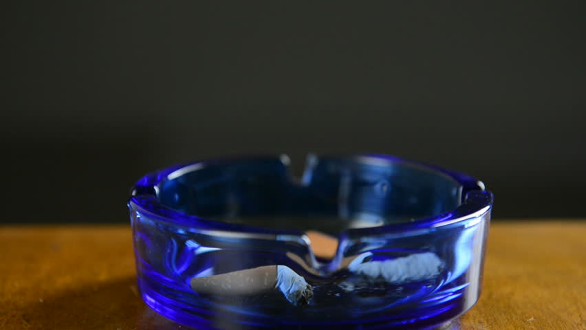 HD1080p: Putting out a cigarette.
Hand puts out a cigarette in an ashtray