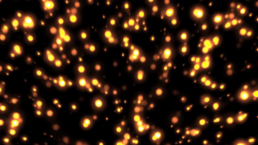 Yellow floating bright light particles move with black background