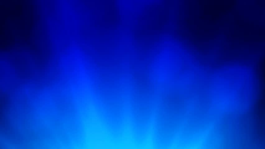 Rotating shinning light streaks up with light particles