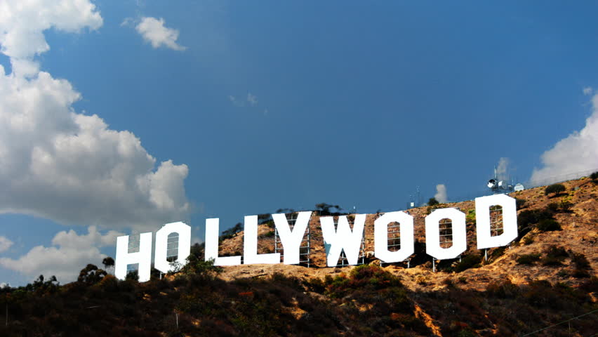 LOS ANGELES - JAN 2012: The world famous Hollywood sign in Los Angeles, California. With timelapse clouds billowing behind. 